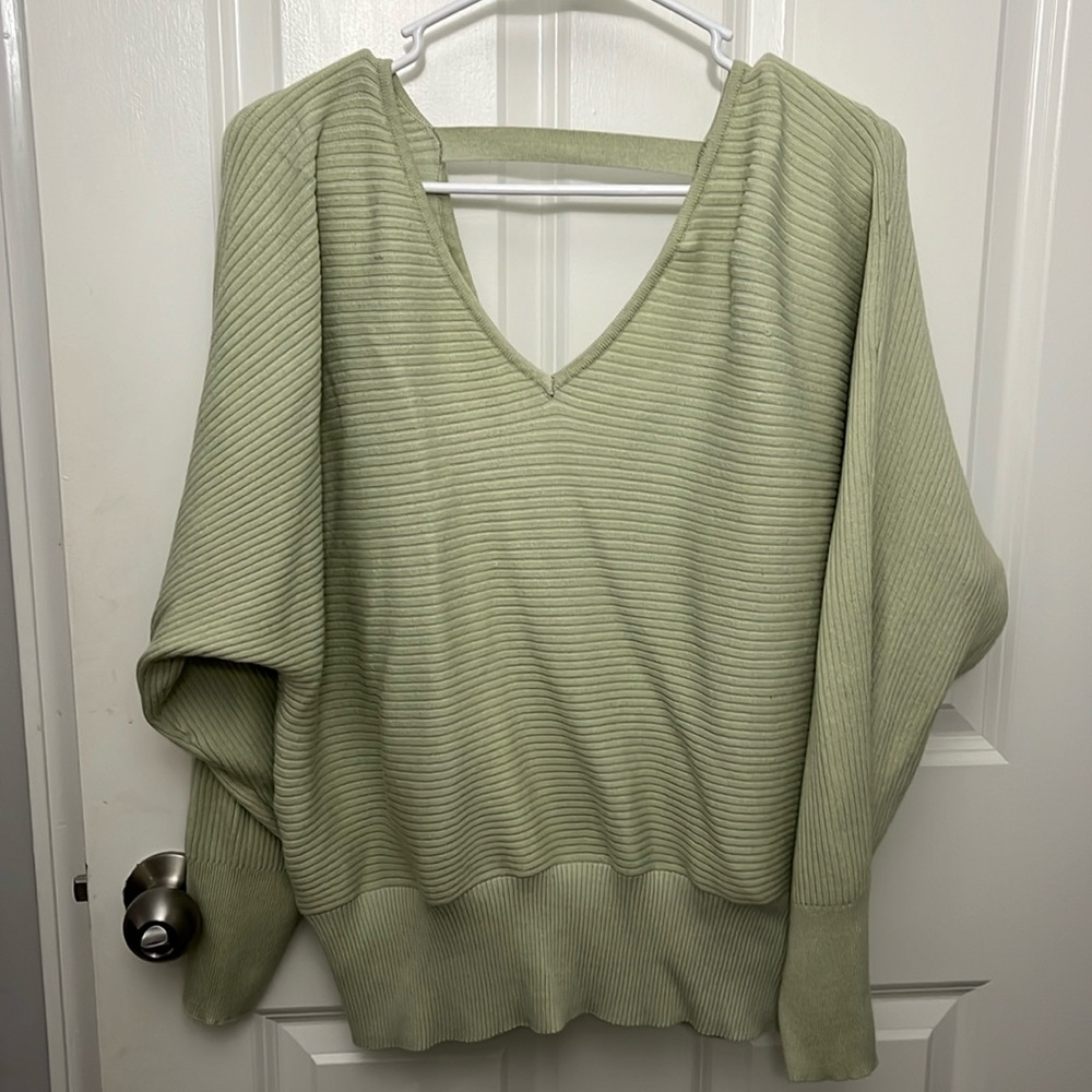 Women’s Batwing Sweater - Large, Light Green. Has one small pill pictured.